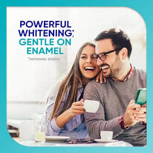 Toothpaste promotional card showing 'Powerful whitening' text and smiling couple