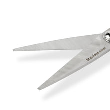 Sewing scissors blades marked stainless steel, with pointed metal tips