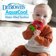 Water-filled baby teether in red apple shape held by a baby