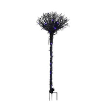 Plastic witch broom greeter with black bristles, handle, and glowing blue LED