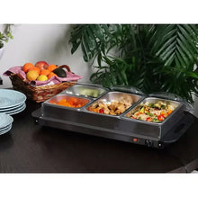 Stainless buffet food warmer with three food trays for serving carrots, meat, and salad