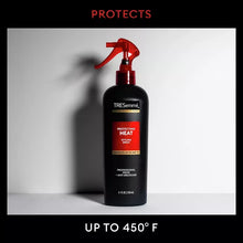 TRESemmé Protecting Heat Styling Spray bottle with red trigger nozzle