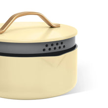 Buttercream covered pan with vented base and curved lid handle