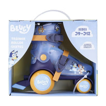 Kids trainer roller skates in box, light blue with orange-brown straps and yellow wheels