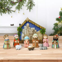 Miniature nativity display with stable, multiple character figures, and animals