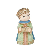 Resin miniature nativity figure of a king in blue sash and green robe, holding a gift