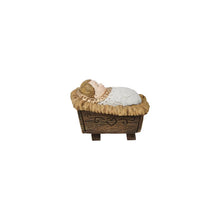 Resin miniature nativity figure of a white lamb lying in a wooden manger