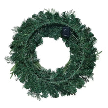 Green faux evergreen wreath with black battery pack on the back