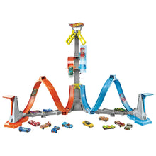 Hot Wheels Loop & Launch track set with orange/blue loop rails and toy cars