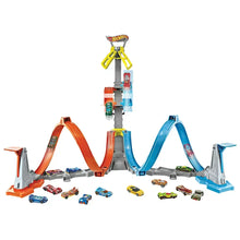 Hot Wheels loop and launch track set with orange and blue rails and car pieces