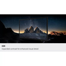 Flat-screen TV showing landscape scene with HDR display