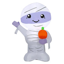Inflatable mummy decoration, white with purple face and waving arm holding orange pumpkin