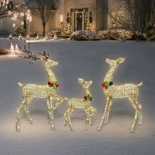 Set of three gold pre-lit reindeer decorations with bell collars, standing