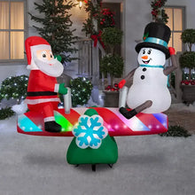 Inflatable Santa and snowman seesaw decoration, red and white with green base