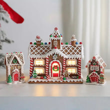 Gingerbread house decor set of three with illuminated windows and festive doors