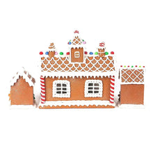 Gingerbread house decoration with candy-cane stripes, scalloped roof, and doors