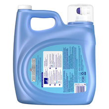 Back view of blue liquid fabric conditioner jug with ingredient and barcode label