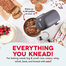 Black stand mixer with stainless bowl and splash guard, shown mixing batter and crumbs.