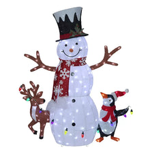 Pre-lit white fabric snowman with top hat and scarf, with reindeer and penguin