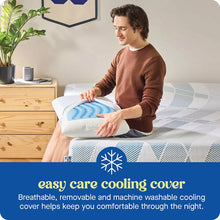 Cooling gel memory foam pillow with white cover and blue wave stripe, held in hands