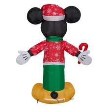 Inflatable Mickey Mouse from behind in red Santa jacket and green pants, round base