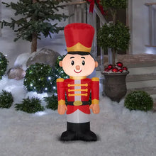 Inflatable Christmas toy soldier with red hat, red coat, gold buttons, black boots