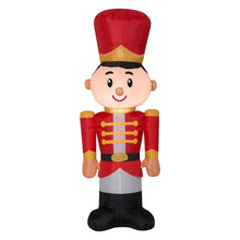 Inflatable toy soldier figure in red and black uniform with gold buttons, smiling face