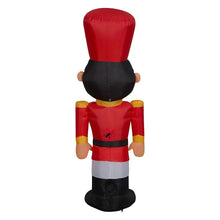 Inflatable toy soldier figure from behind with red hat and red coat, black legs and boots