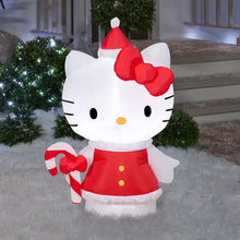 Inflatable Hello Kitty in red Santa dress with striped candy cane, bow at neck