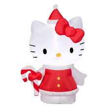 Inflatable Hello Kitty in red Santa dress holding a striped candy cane