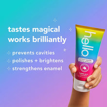 Kids fluoride toothpaste tube in yellow gradient with unicorn graphic