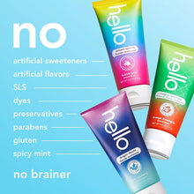 Kids fluoride toothpaste tubes, blue, pink, and green, with ingredient text