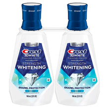 Crest 3D White whitening mouthwash twin bottles with blue caps, enamel protection labels