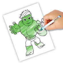 Hand coloring a Spidey character drawing on a white paper card with a marker