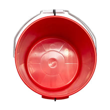 Red plastic bucket lid interior with central cap and wire handle