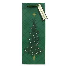 Dark green holiday gift bag with white tree graphic and dangling snowflake lights