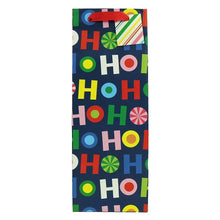 Navy holiday gift bag with repeating 'HO HO HO' circles and colorful ornament accents