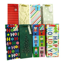 Assorted holiday gift bag set with colorful patterns and handles, featuring text and characters