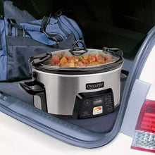 Stainless steel travel slow cooker with domed lid and digital timer display