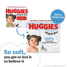 Huggies Snug & Dry diaper boxes featuring baby photo and “New & Improved” badge