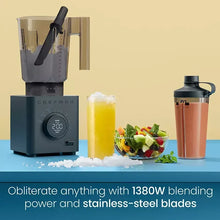 Countertop blender with clear jar, black lid, and dark base with control dial
