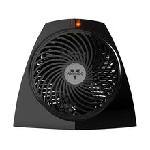 Black personal heater with circular fan grille and warm LED glow