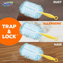 Swiffer duster refills with yellow-handled duster head on wood floor