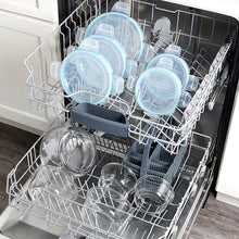 Food storage containers with blue lids arranged in a dishwasher rack