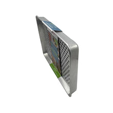 Oven crisping set: perforated rack set with metal frame, three-quarter side view.
