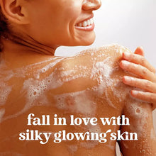 Scented body wash lather on skin with hands applying foam