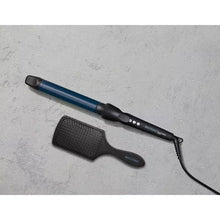 Long barrel curling iron with blue barrel, black cord, and paddle brush