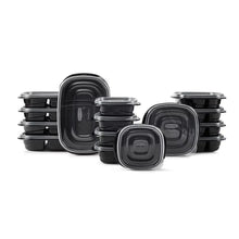 Stacked black meal prep containers with matching lids