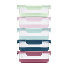 Glass food storage containers with mint, lavender, teal, and navy lids