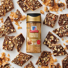 English toffee finishing sugar bottle with scattered candy pieces around it